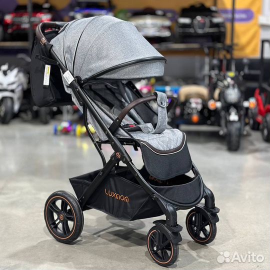 Новая прогулочная коляска luxmom серая