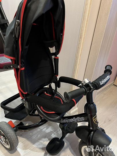 Трехколесный велосипед с ручкой