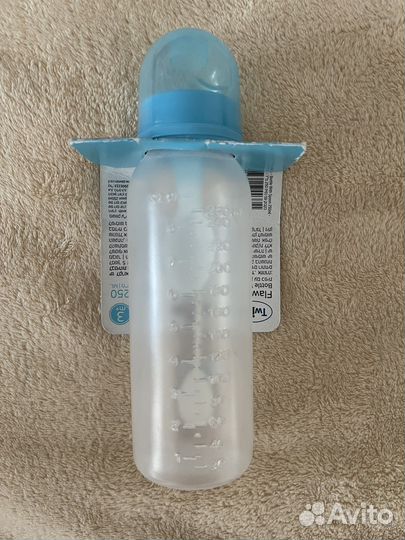 Бутылочка с ложкой внутри Новая