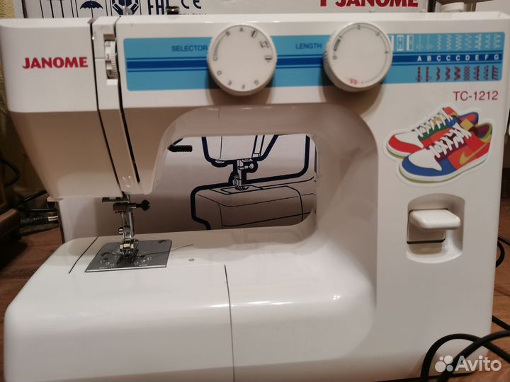 Швейная машина Janome TC 1212