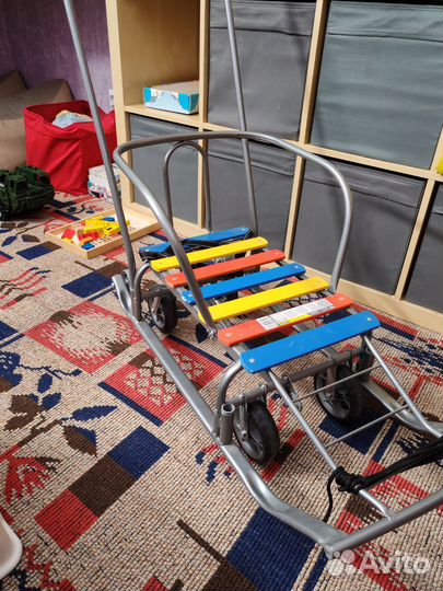 Детские санки с колесами и чехлом