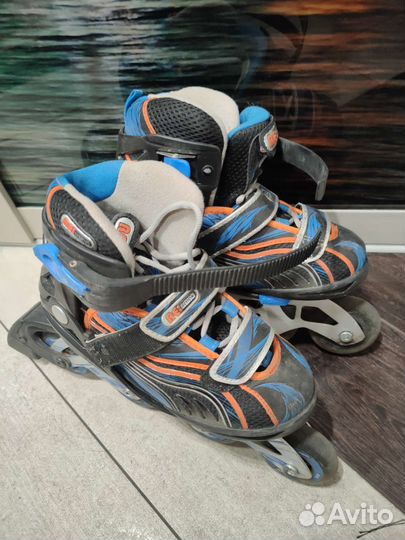 Роликовые коньки reaction