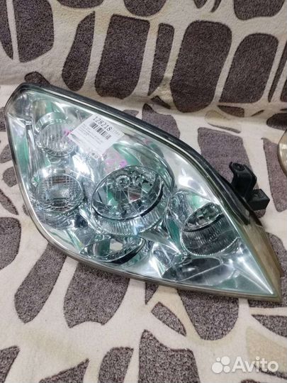 Фара левая ниссан примера р12, оригинал