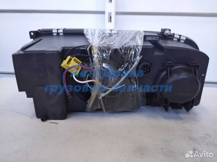 Фара Мерседес Актрос Аксор левая ручная регулировка