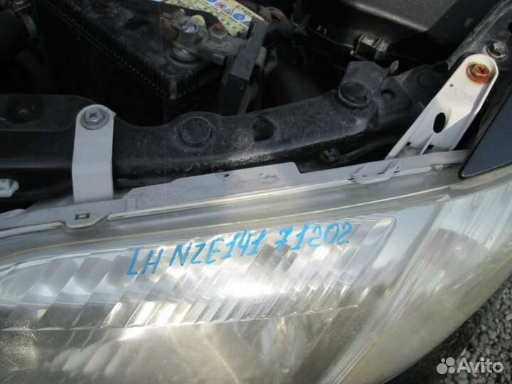 Фара левая Toyota Corolla Fielder NZE141 1NZ-FE