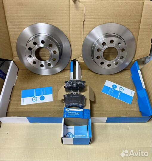 Тормозные диски и колодки задние Skoda Octavia A7