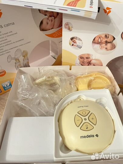 Молокоотсос medela электрический