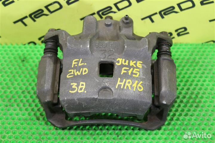 Суппорт тормозной передний левый Nissan Juke F15