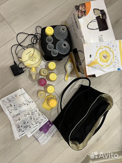 Молокоотсос medela