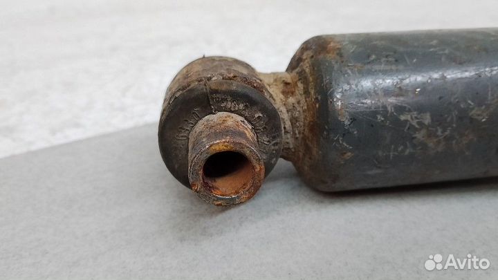 Амортизатор задний левый