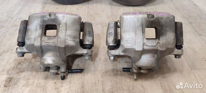 Суппорта и диски передняя Mitsubishi Lancer 10