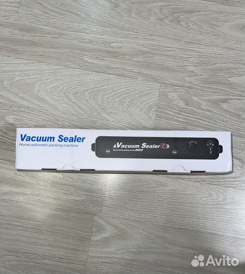 Вакуумный упаковщик