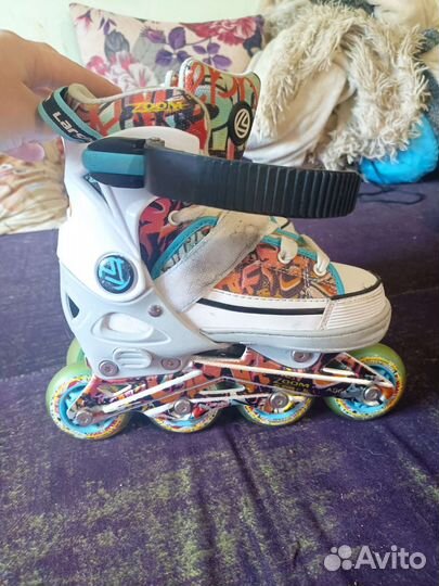 Роликовые коньки