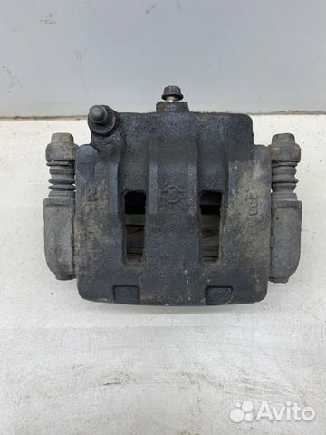 Суппорт передний правый Nissan Liberty QR20 2.0