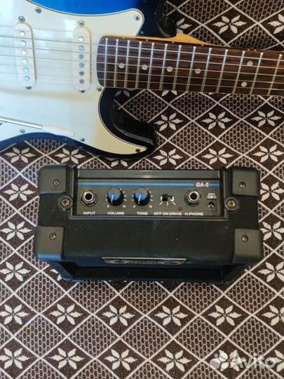 Электро гитара + комбоусилитель Rocket