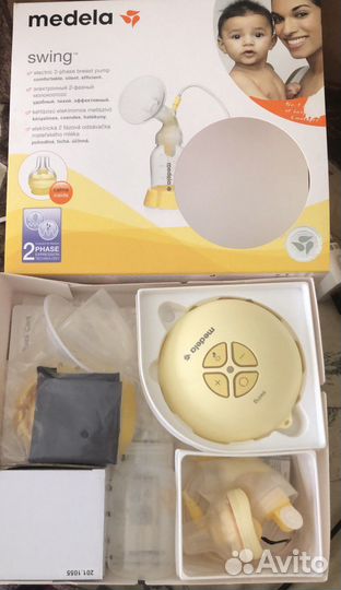 Молокоотсос medela электрический