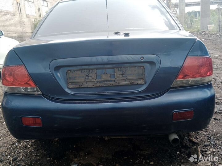 Задний бампер mitsubishi lancer 1.3 2005