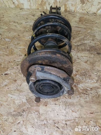 Стойка амортизатора Mitsubishi carisma (каризма)