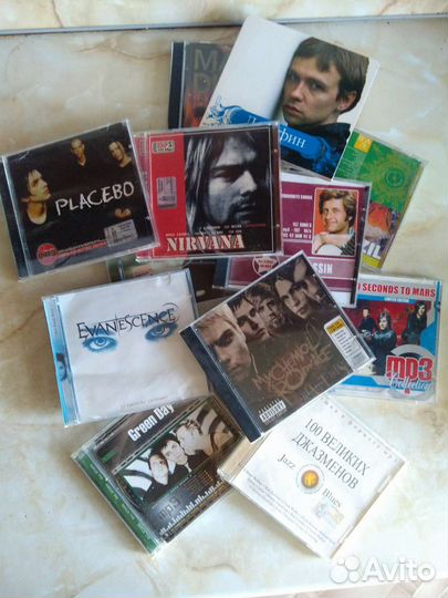 Музыкальные cd диски(в основном рок двухтысячных)
