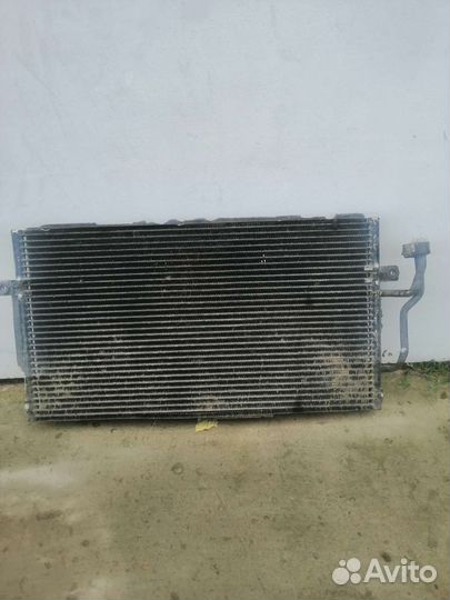 Радиатор кондиционера Митсубиси каризма