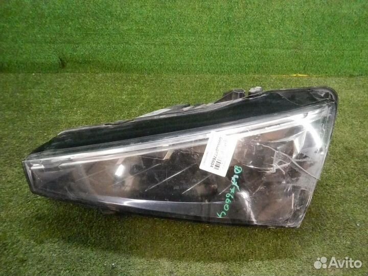 Фара левая Skoda Rapid