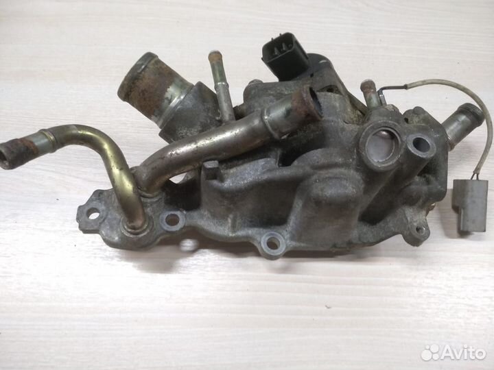 Корпус термостата Ниссан Икс Трейл T31 11060EN200