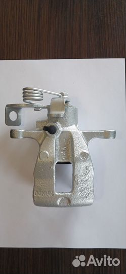 Суппорт тормозной задний левый solaris