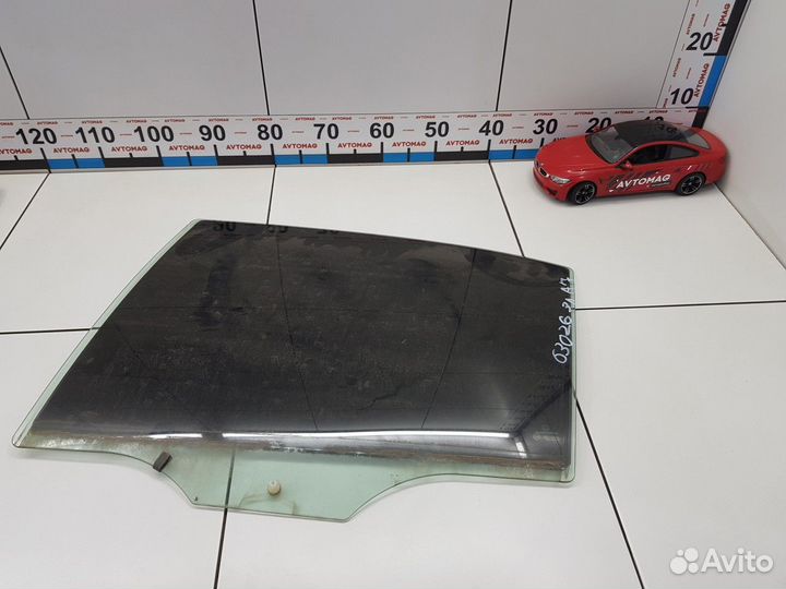 Стекло двери заднее левое (Skoda Octavia)