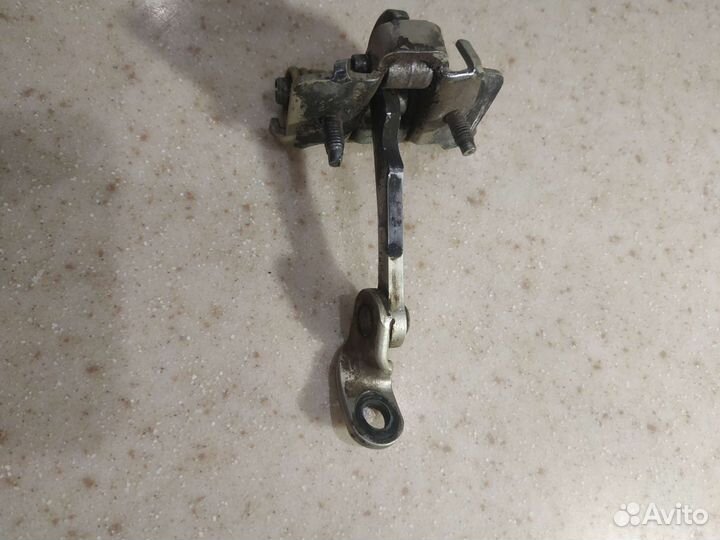 Ограничитель двери Пежо 206