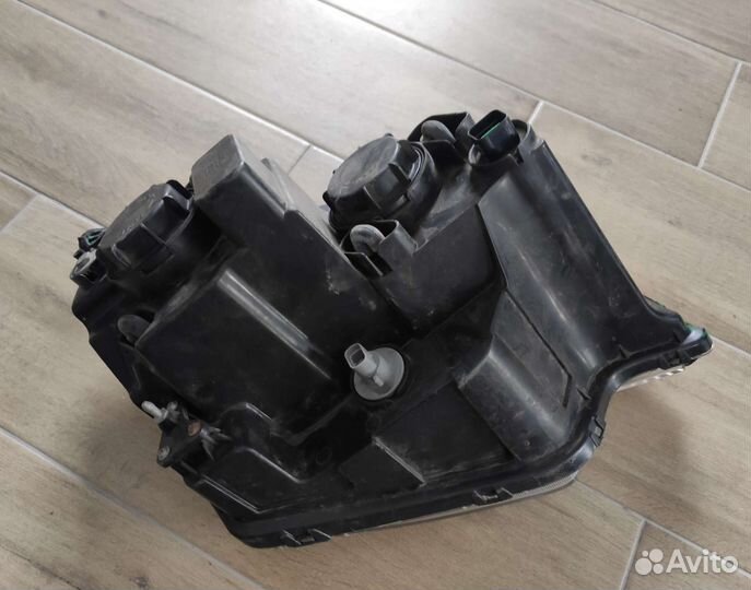 Фара левая Opel Antara