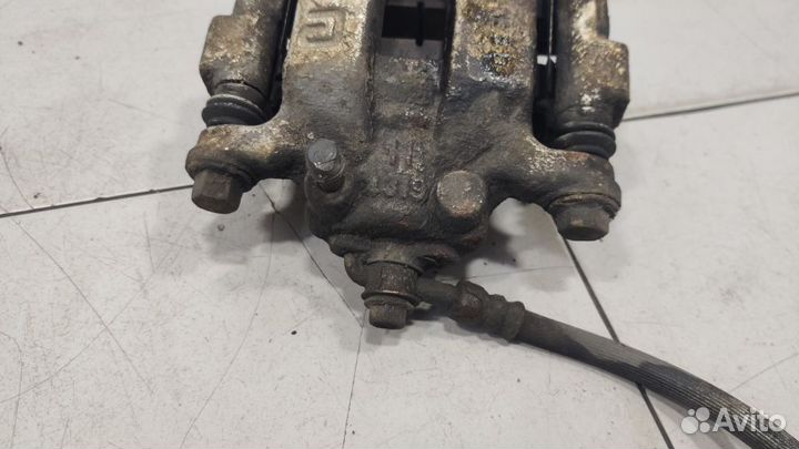 Суппорт задний правый Nissan Pathfinder R52