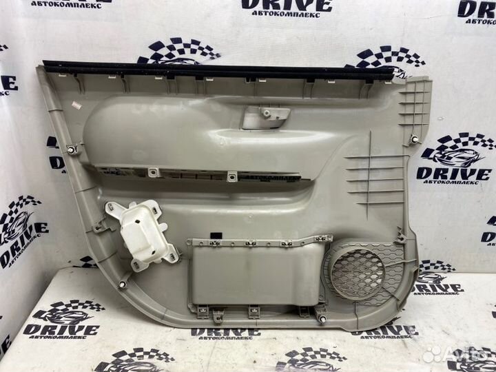 Обшивка двери передняя правая Toyota Passo M700A