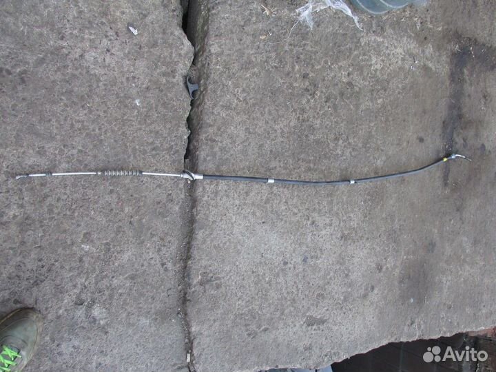 Трос стояночного тормоза передний