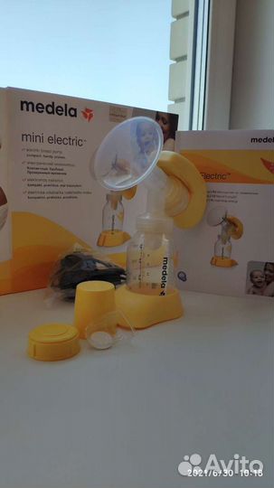 Молокоотсос medela электрический