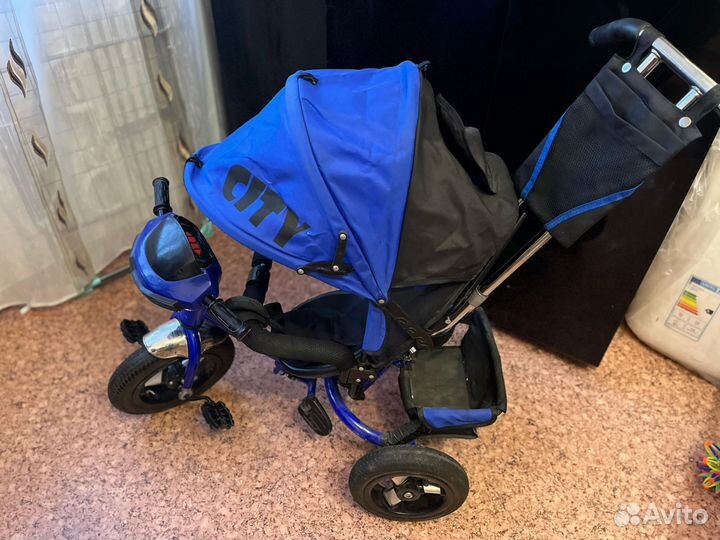 Трехколесный велосипед с ручкой