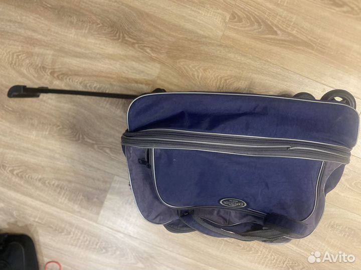 Сумка дорожная на колесах с выдвижной ручкой