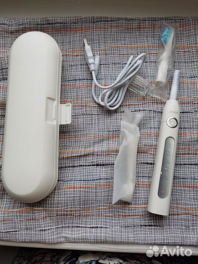 Электрическая зубная щетка seago