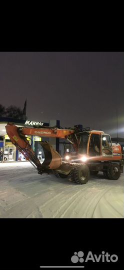 Машинист экскаватора полноповоротный колесный