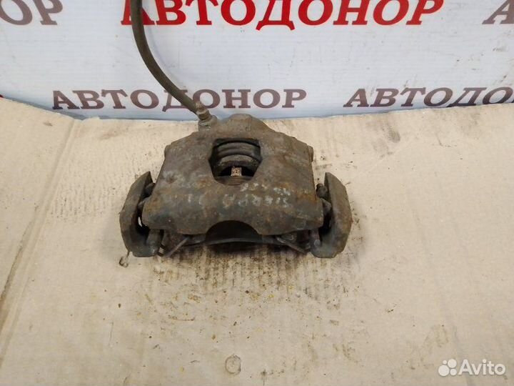 Суппорт тормозной передний левый Ford Sierra 2.0