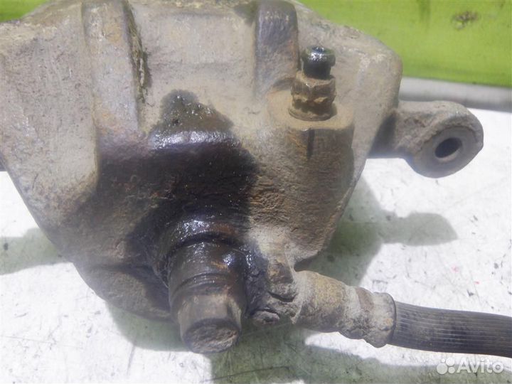 Суппорт передний правый Хендай Лантра 96-00