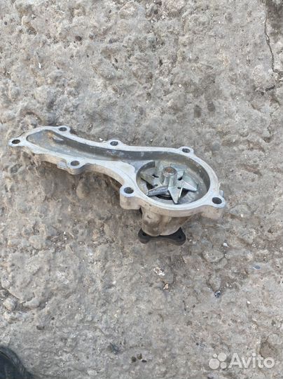 Водяная помпа Nissan qg18de