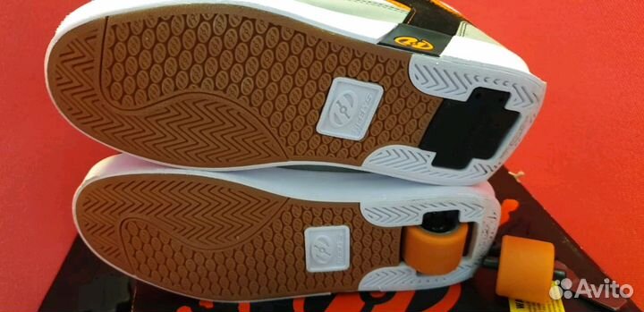 Роликовые кроссовки Heelys