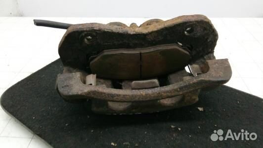 Суппорт тормозной передний левый KIA sorento 1 (93