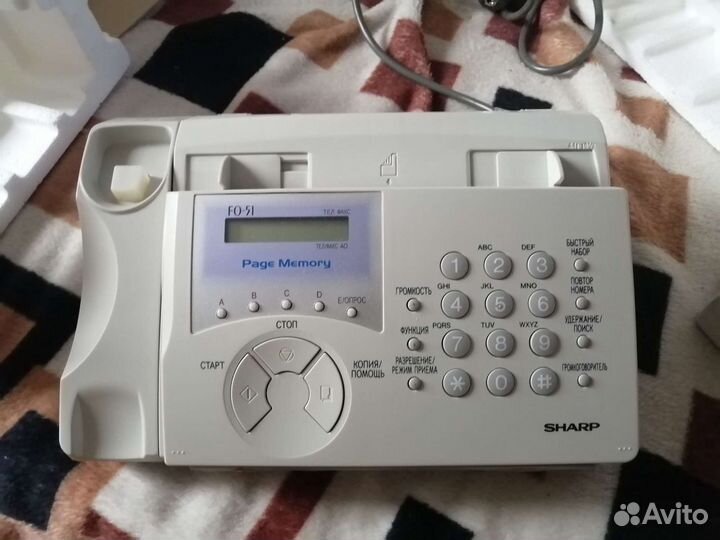 Телефон - факс Sharp