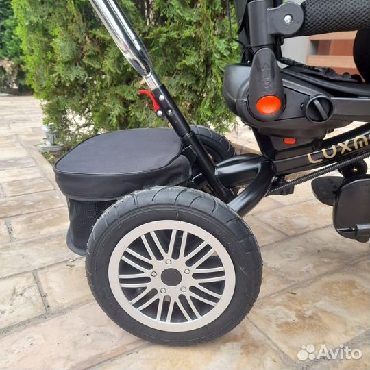 Трехколесный велосипед с ручкой