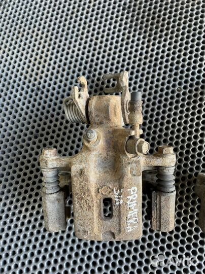 Суппорт задний Nissan Primera P11