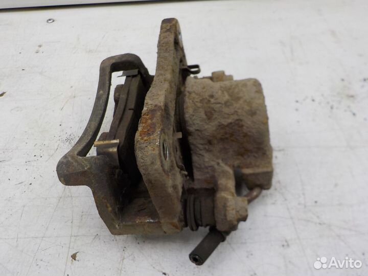 Суппорт тормозной задний левый Chevrolet Captiva