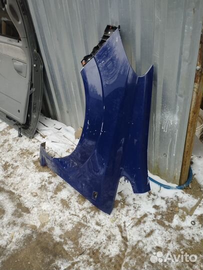 Крыло левое opel zafira b