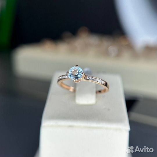 Золотое кольцо с топазом 585 проба