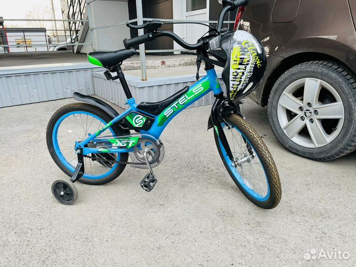 Велосипед с дополнительными колесами детский